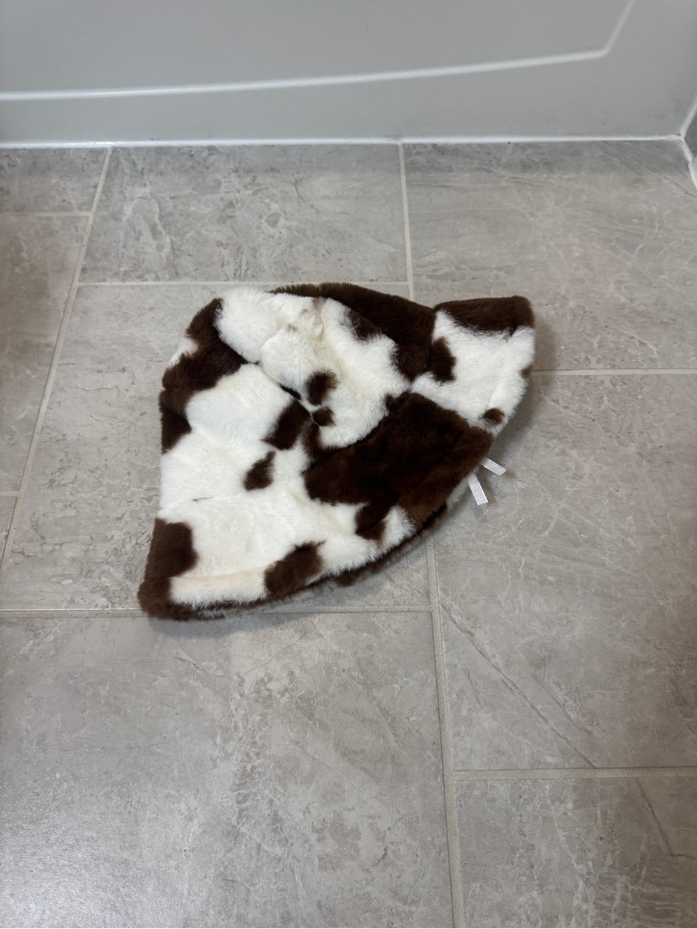 Urban Outfitters White and Brown Faux Fur Cow-Print Bucket Hat